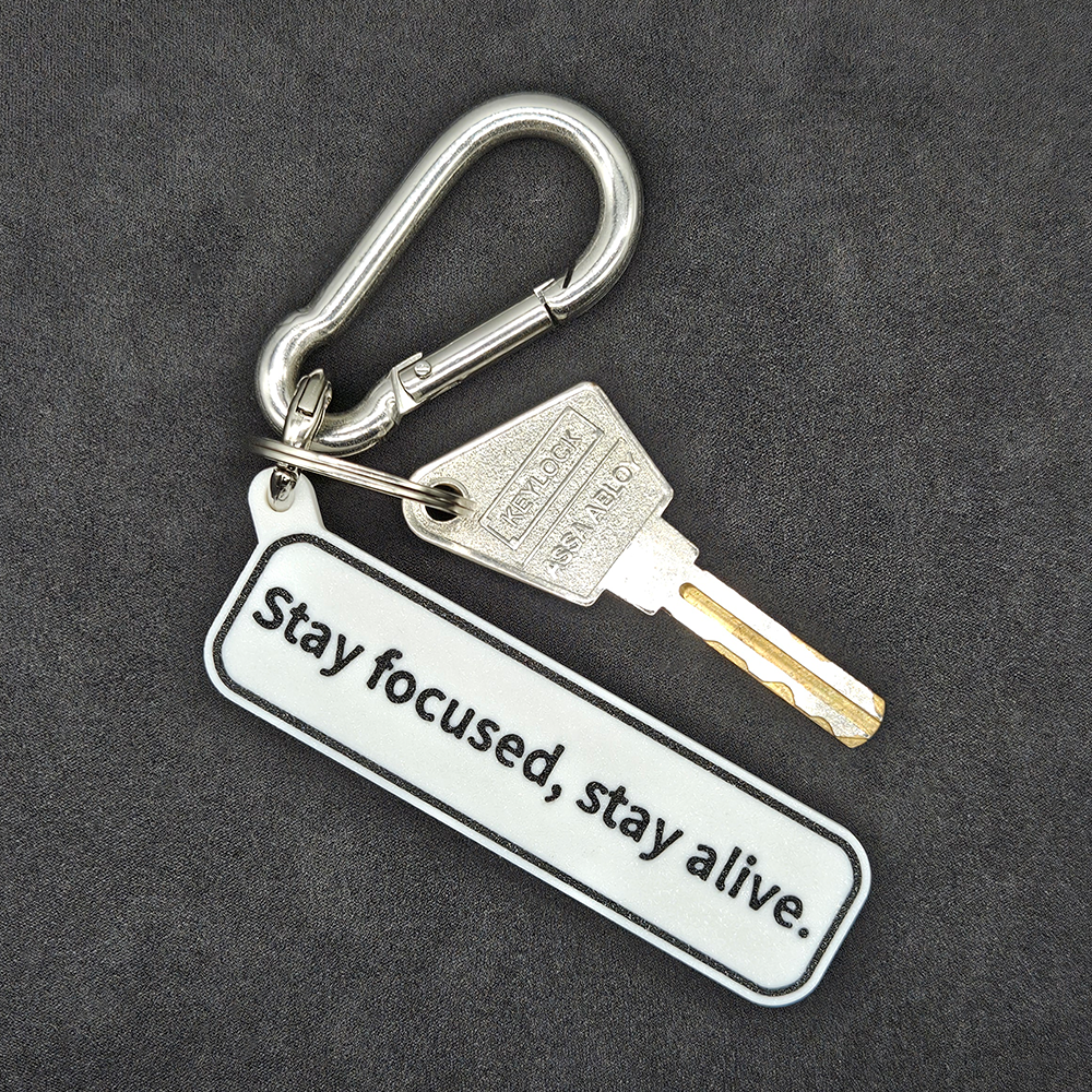 "Stay focused, stay alive" Keychain Pendant Bag Charms